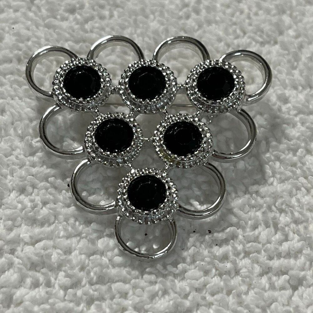 Vintage Sarah Coventry triangle open design black glass brooch